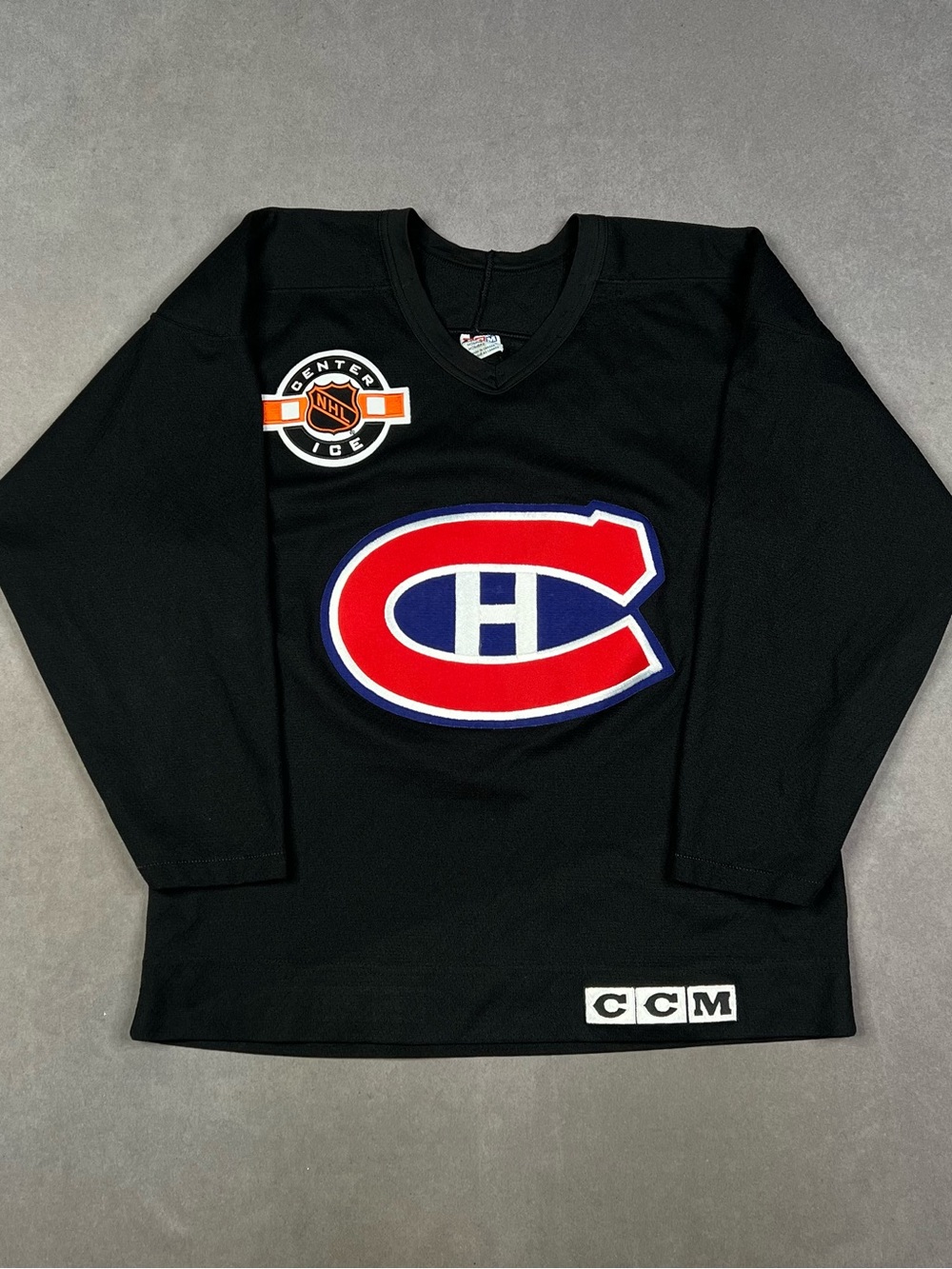 Vintage CCM Black Hockey Jersey with Red & Blue Crest